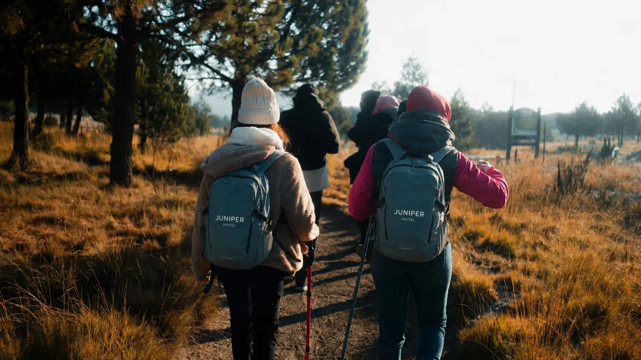 A group of friends take the Juniper gear rentals on a hike