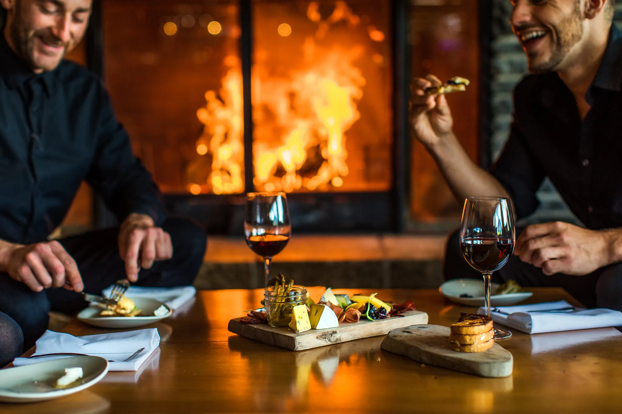 Cocktails by the fire in the Juniper Lounge