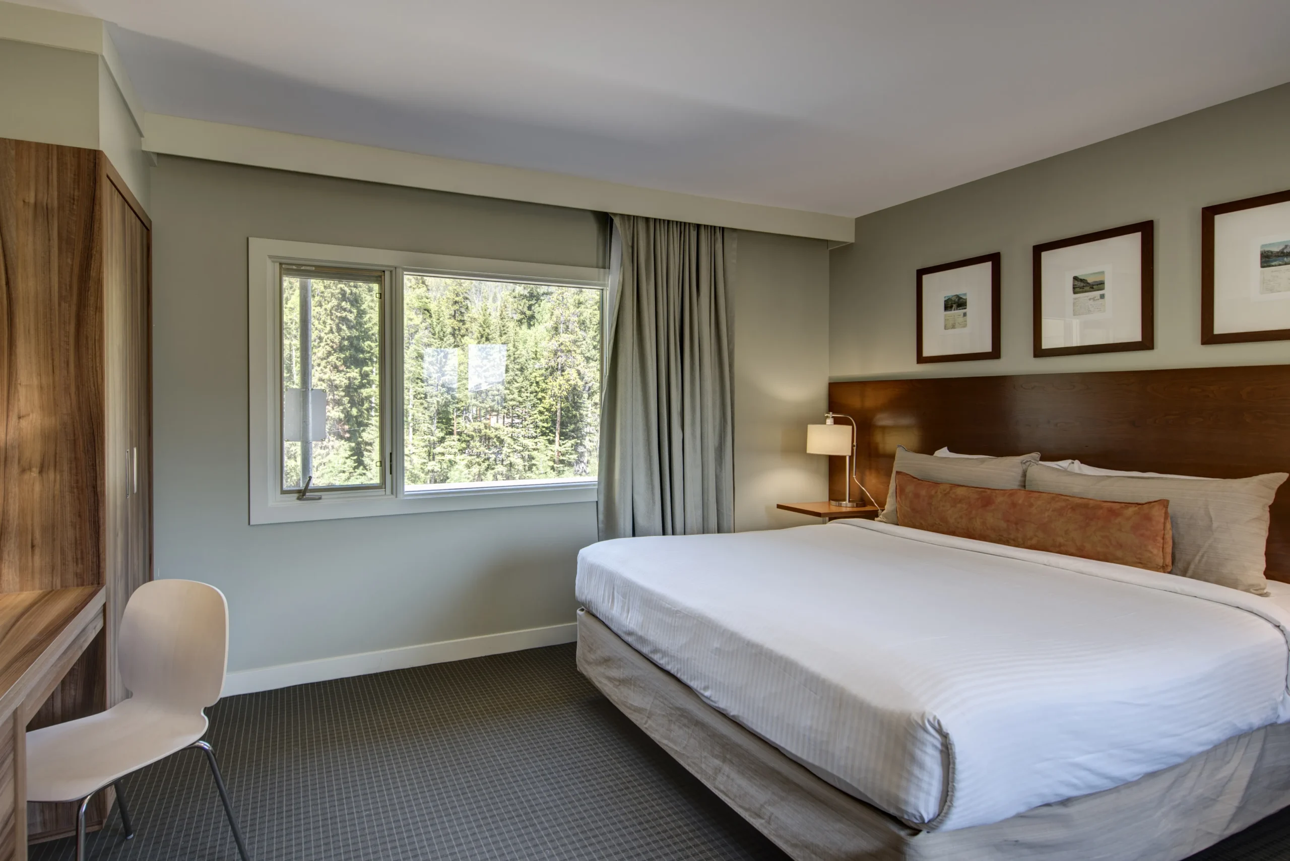 The double bed in the forest view room of the 3-bedroom suite