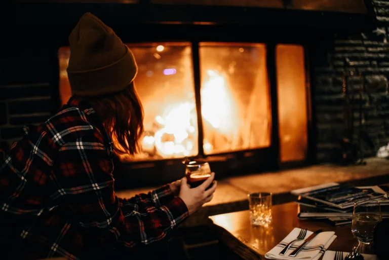 Cocktails by the fire in the Juniper Lounge