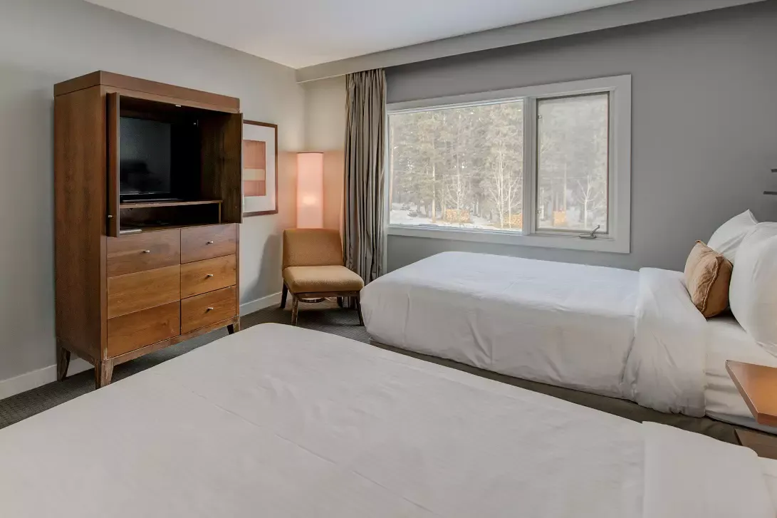 Wake up to views of Mount Norquay and the forest in our cozy Standard Two Double Room – the perfect launchpad for your Banff adventure.