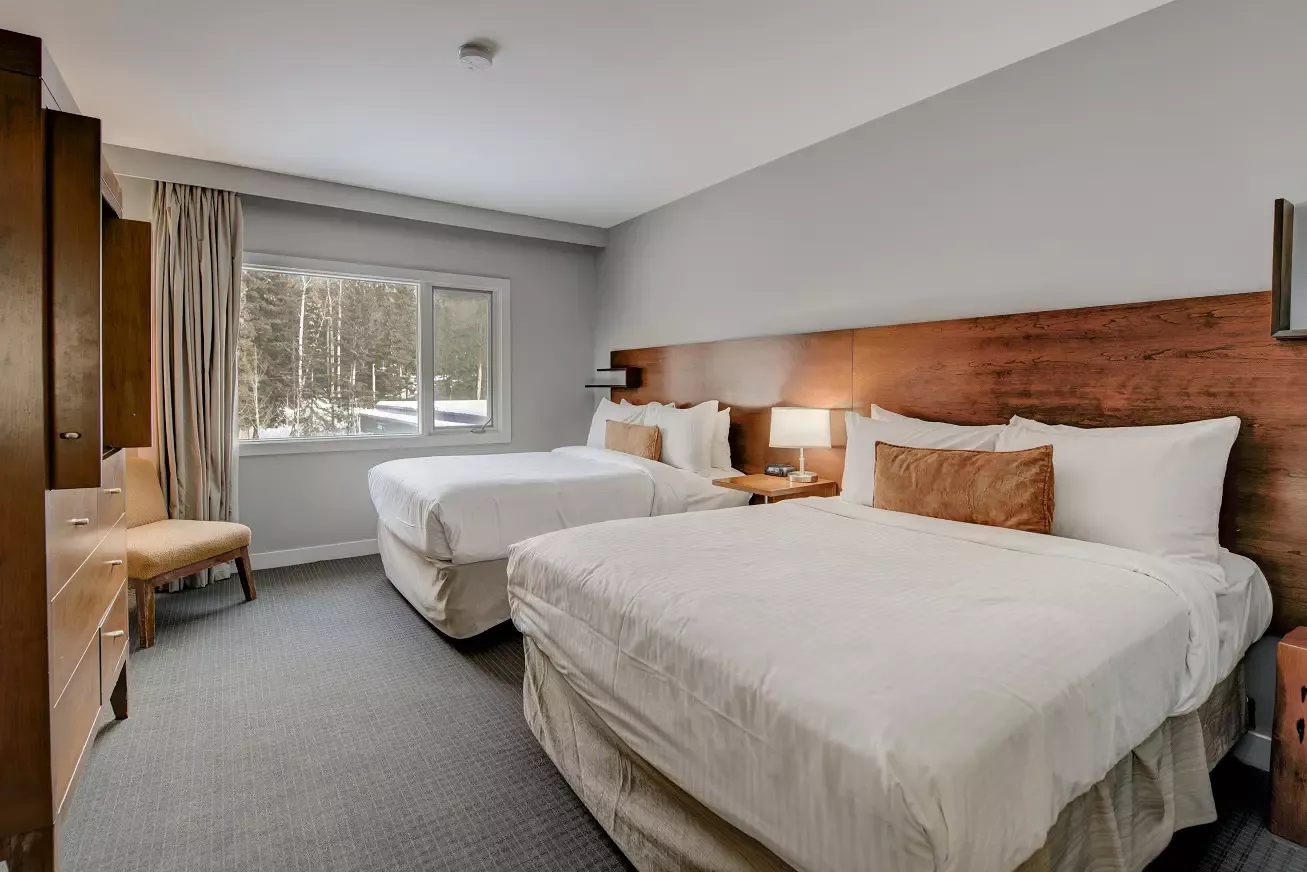Wake up to views of Mount Norquay and the forest in our cozy Standard Two Double Room – the perfect launchpad for your Banff adventure.