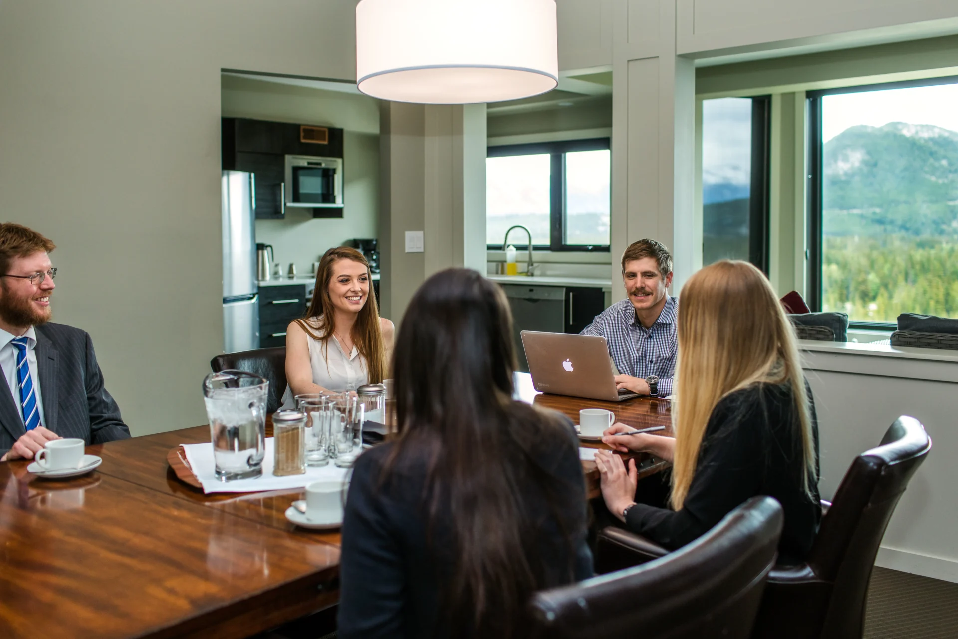 A group of professionals meet at the Juniper