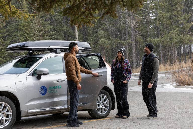 Staff describing where to go in Banff